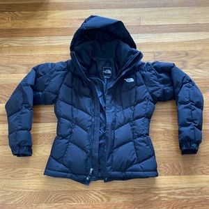 Like new & hardly worn black down North Face ski jacket with hood. Size XS.